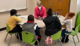 Liz Hasty spotlight with students