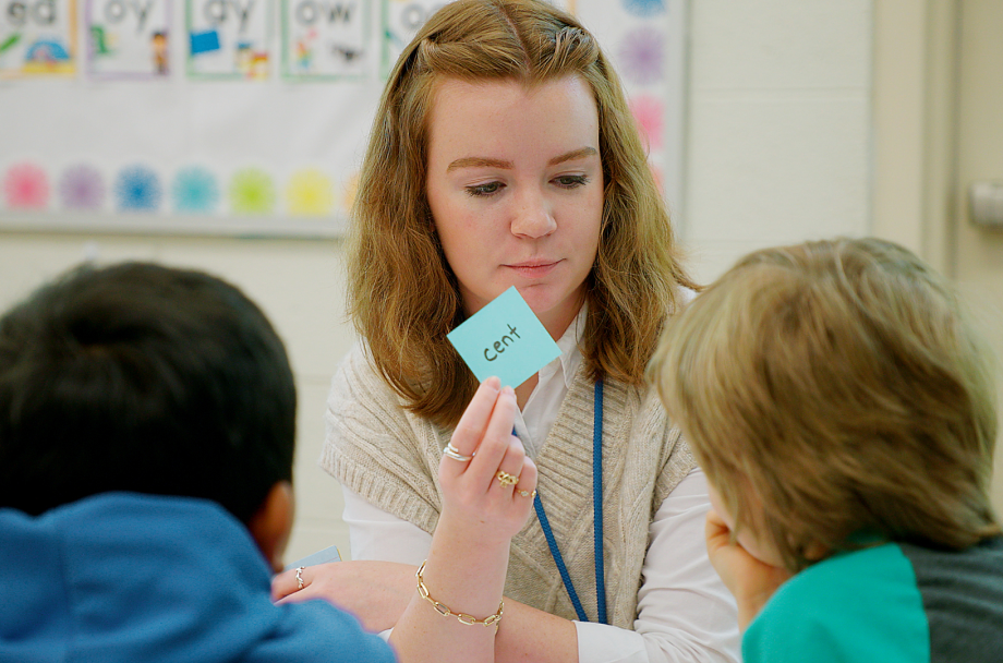 College Student Tutor with Flash Card