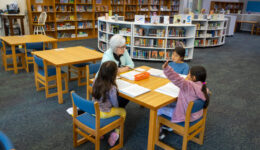 tutors and students working