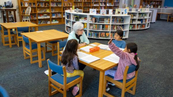 tutors and students working