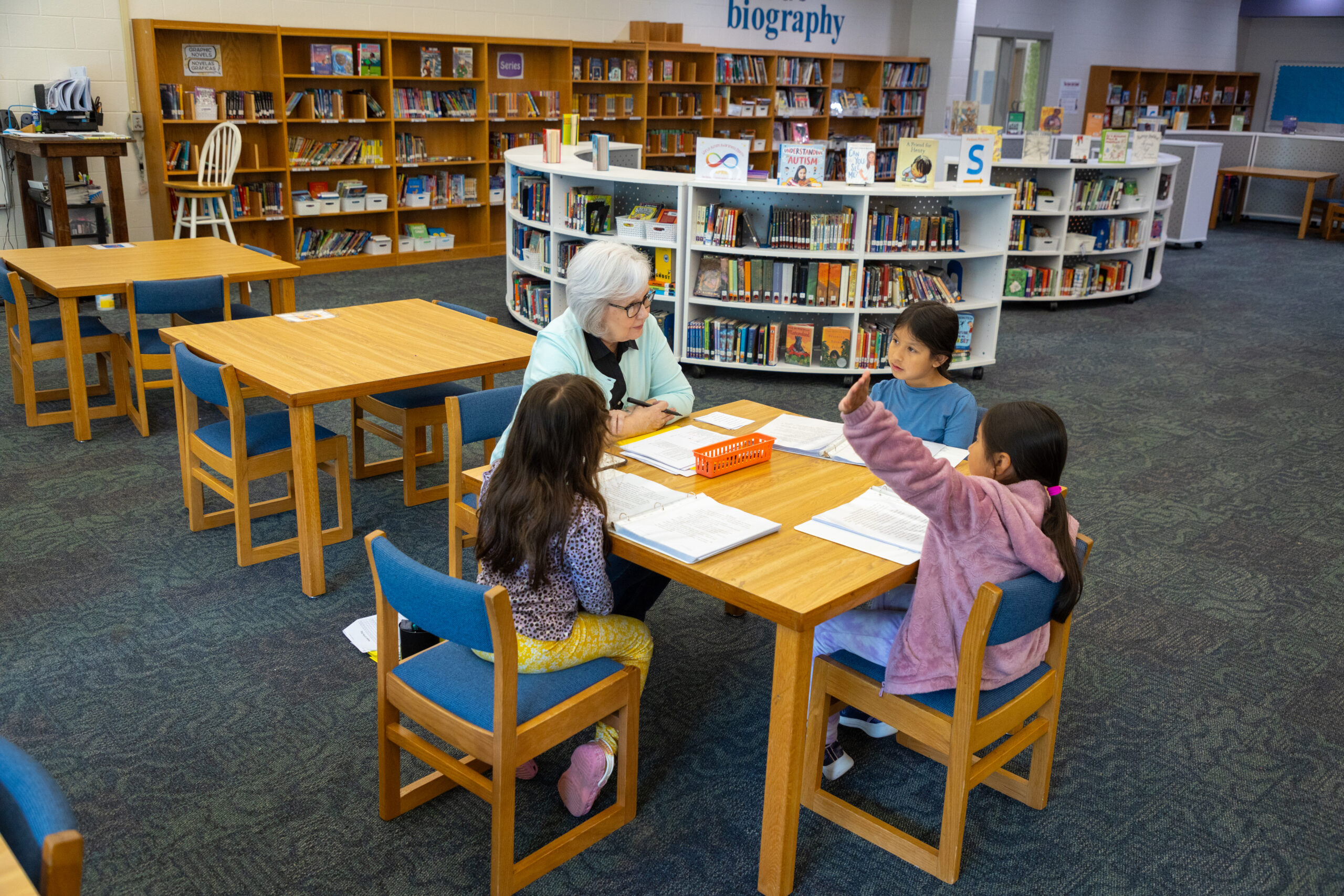 tutors and students working